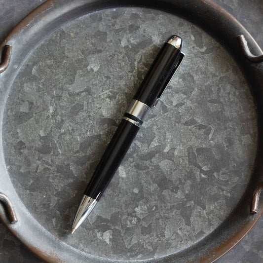 Executive Classic Black Pen. Retractable ballpoint, black ink.