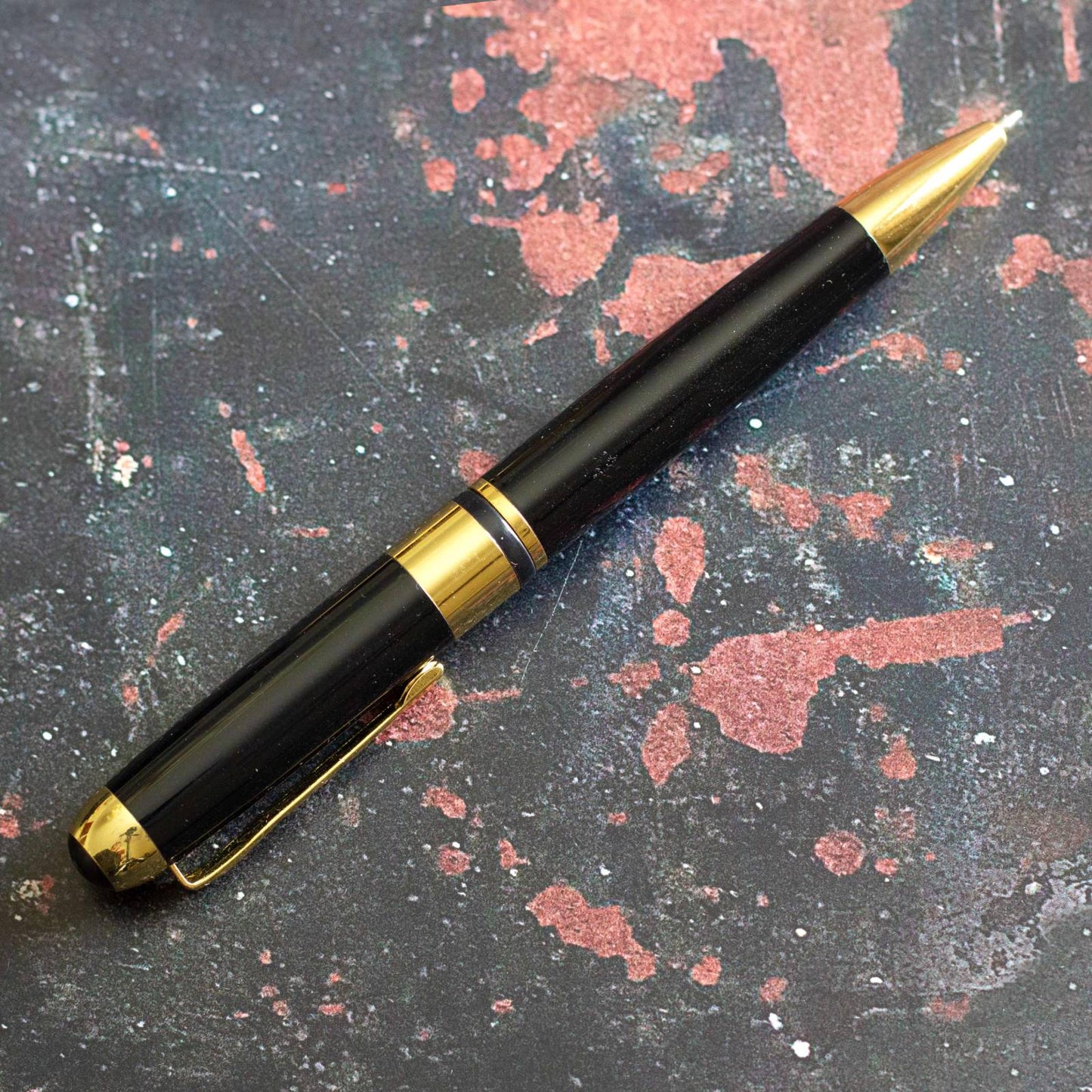 Executive Classic Black Pen. Retractable ballpoint, black ink.