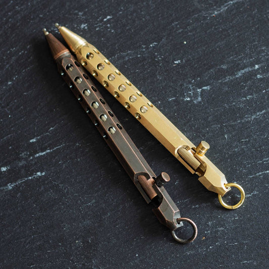 Industrial Metal Pen. Black ink, ballpoint pen. Rugged, compact design.