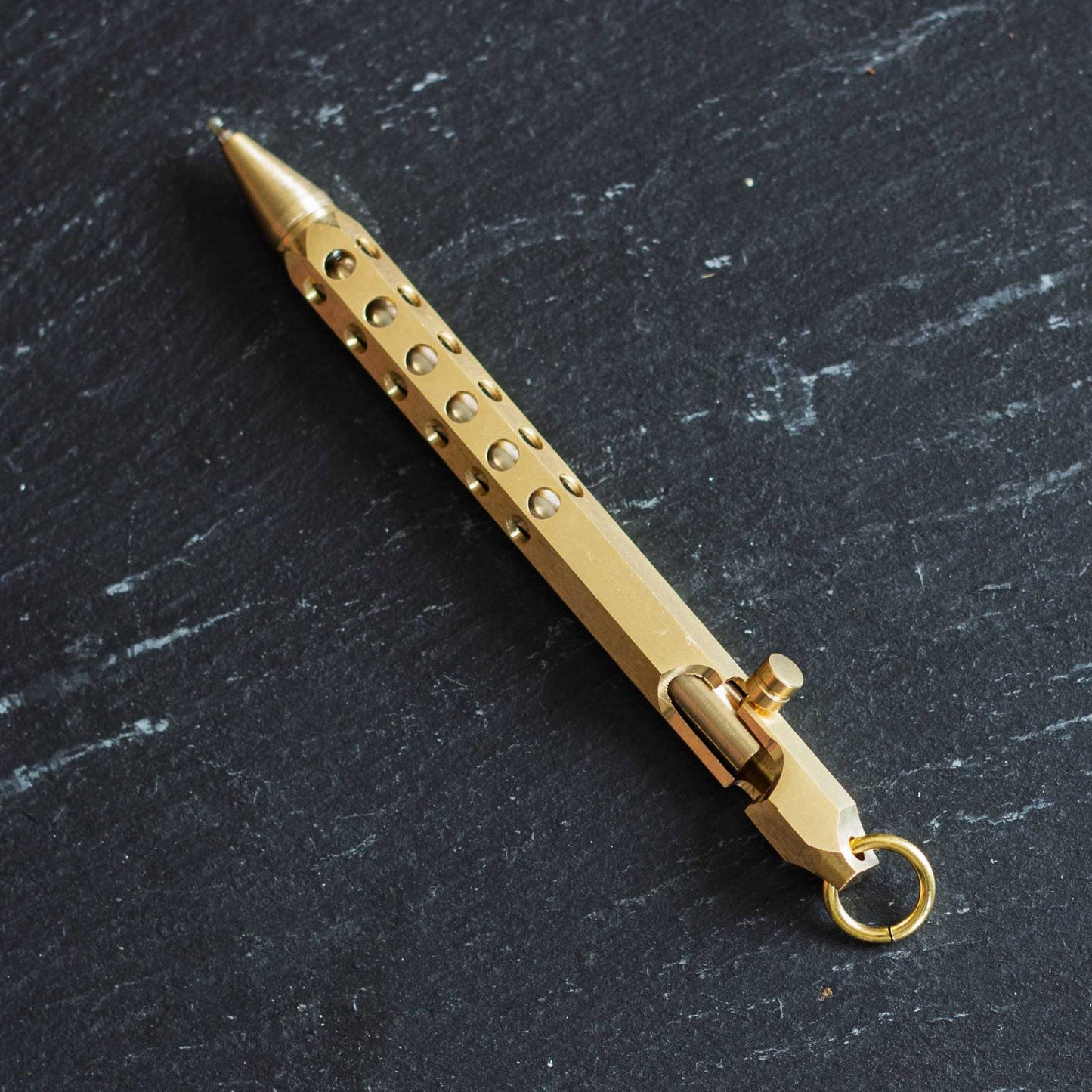 Industrial Metal Pen. Black ink, ballpoint pen. Rugged, compact design.