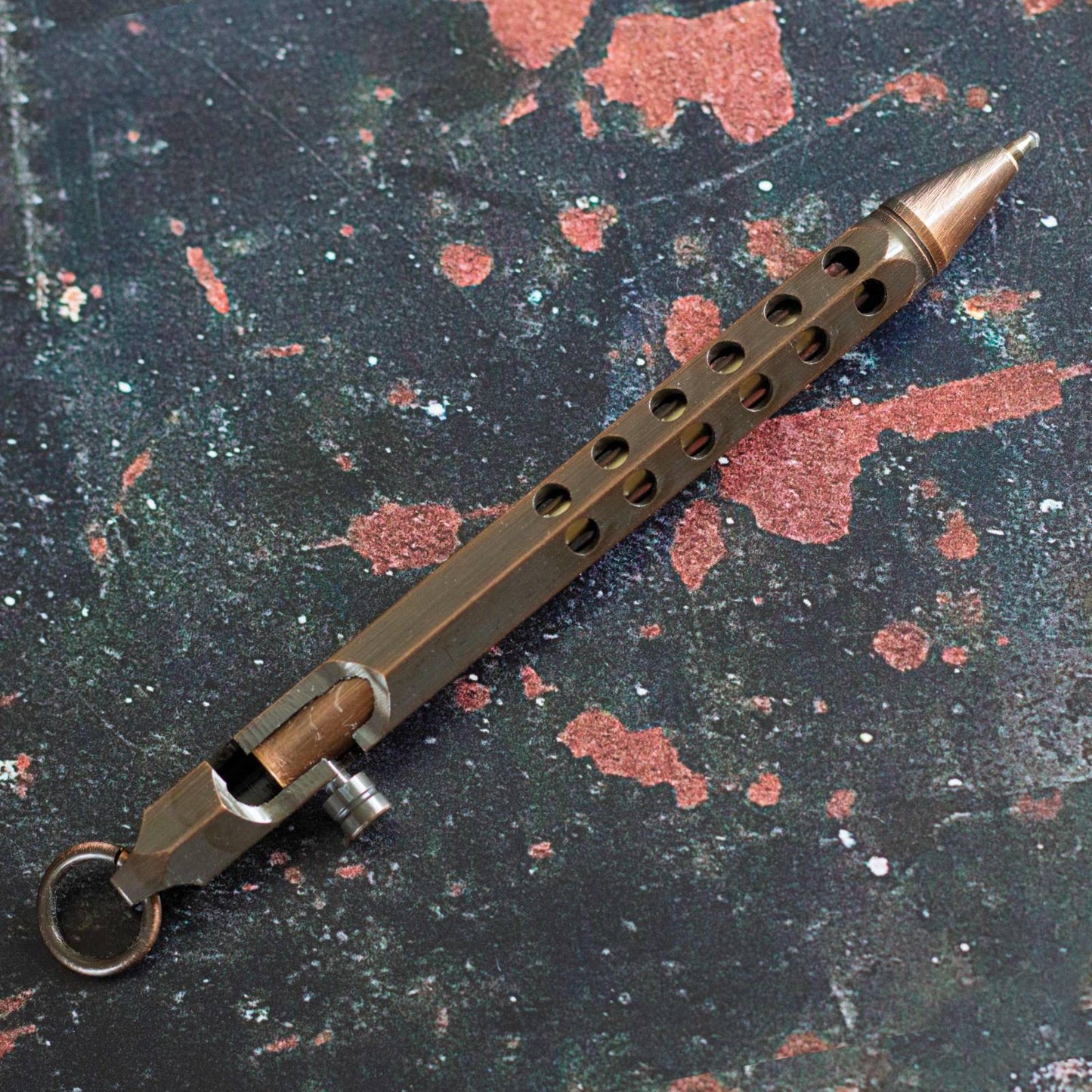 Industrial Metal Pen. Black ink, ballpoint pen. Rugged, compact design.