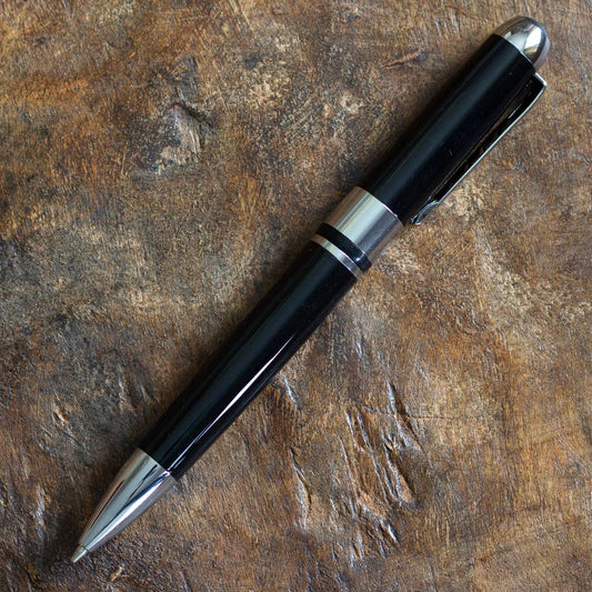 Executive Classic Black Pen. Retractable ballpoint, black ink.