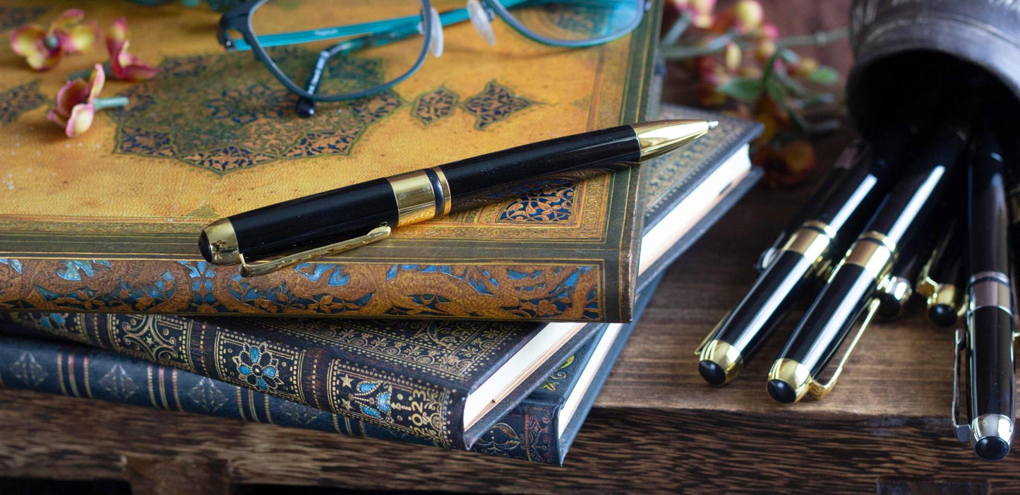 Executive Classic Black Pen. Retractable ballpoint, black ink.