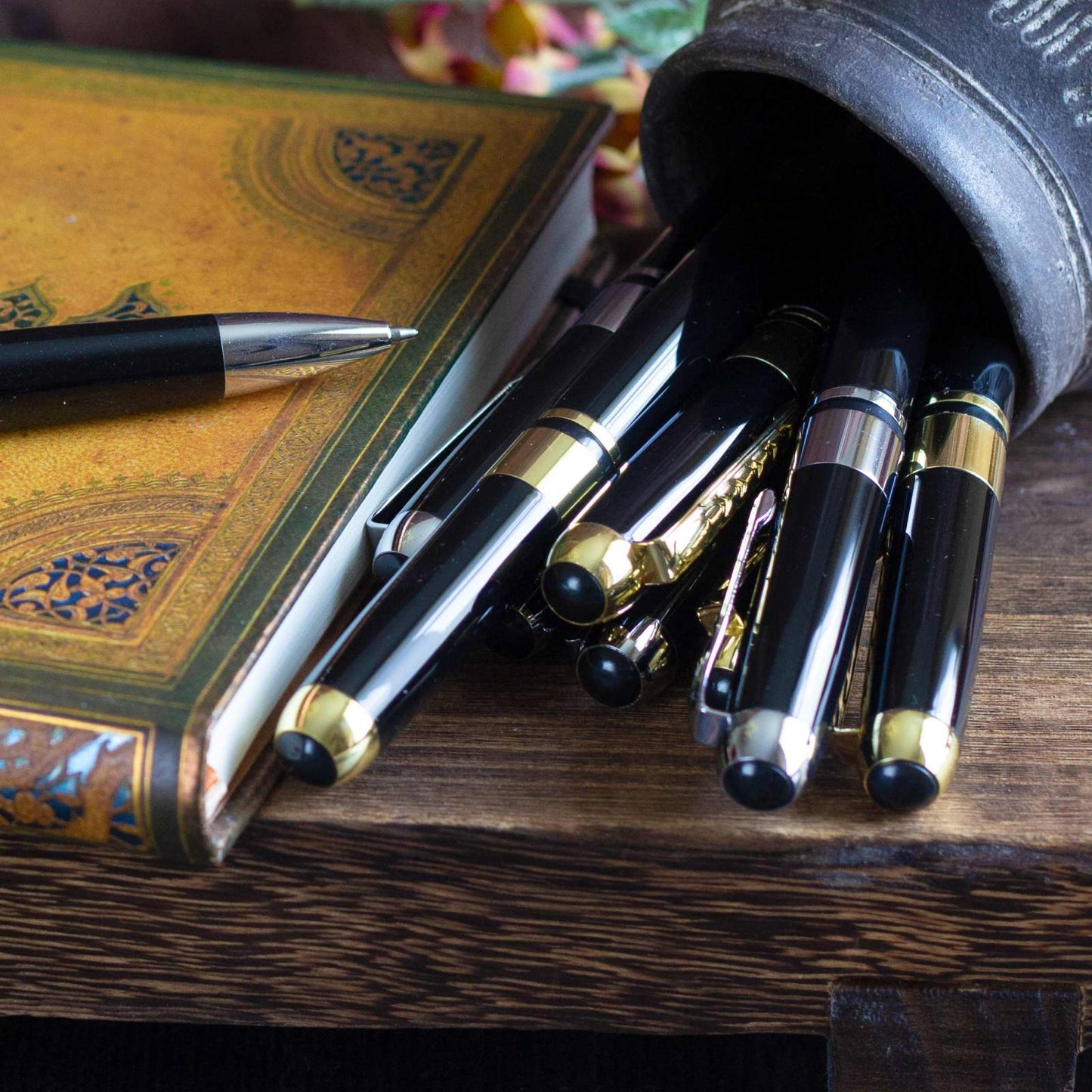 Executive Classic Black Pen. Retractable ballpoint, black ink.