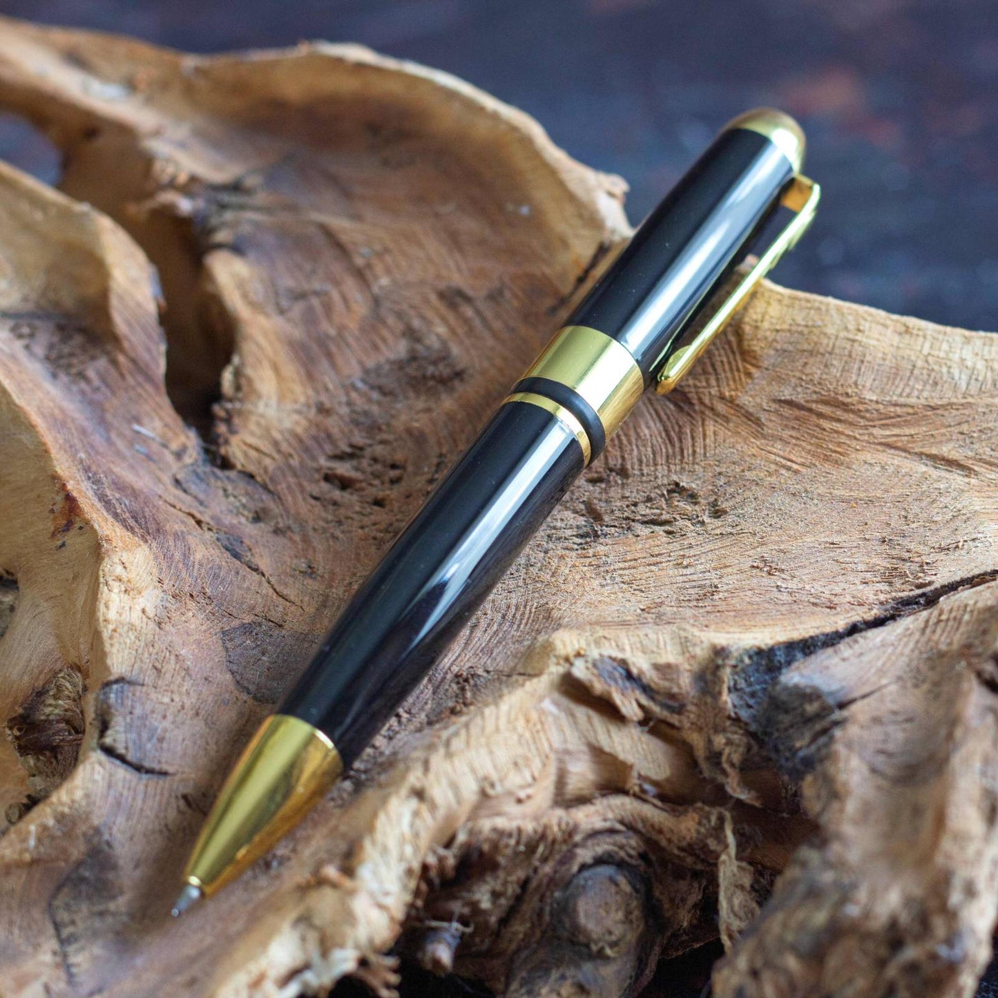 Executive Classic Black Pen. Retractable ballpoint, black ink.